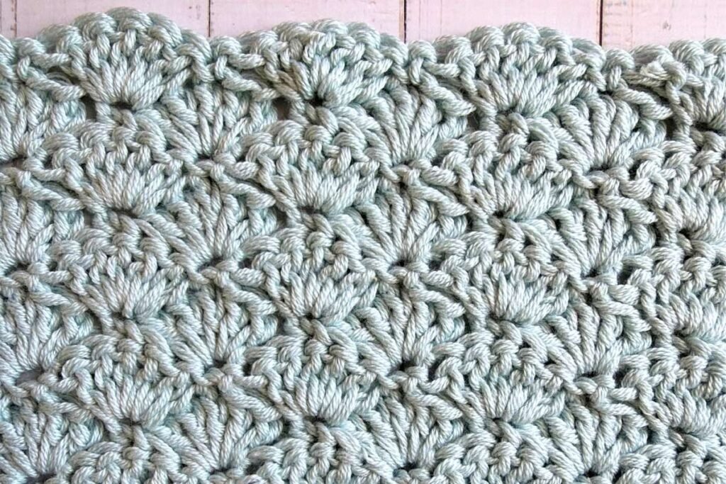 Close up of the crochet classic shell stitch