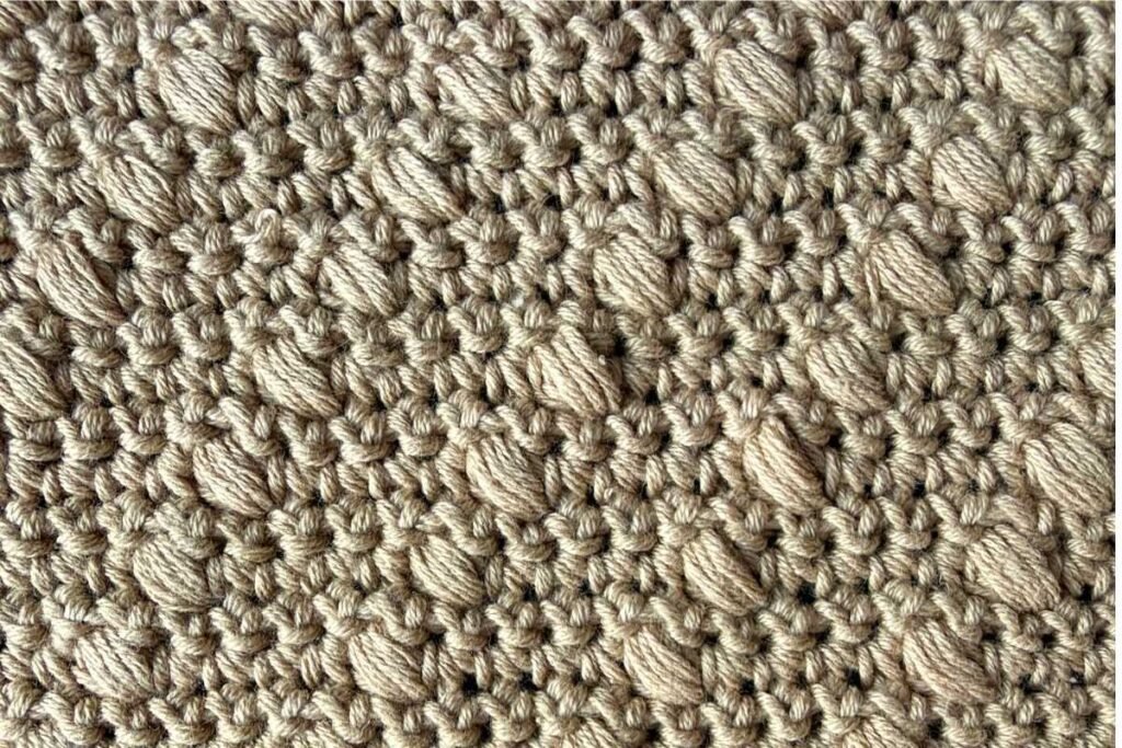 Swatch of a crochet diagonal bobble stitch