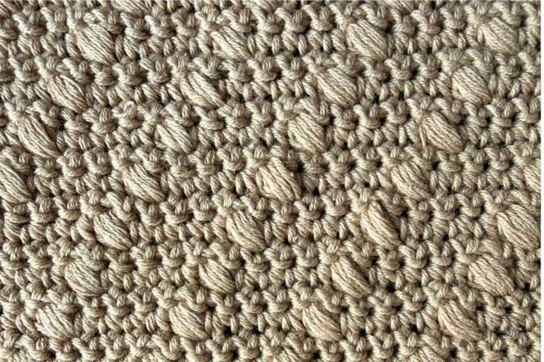 Swatch of a crochet diagonal bobble stitch