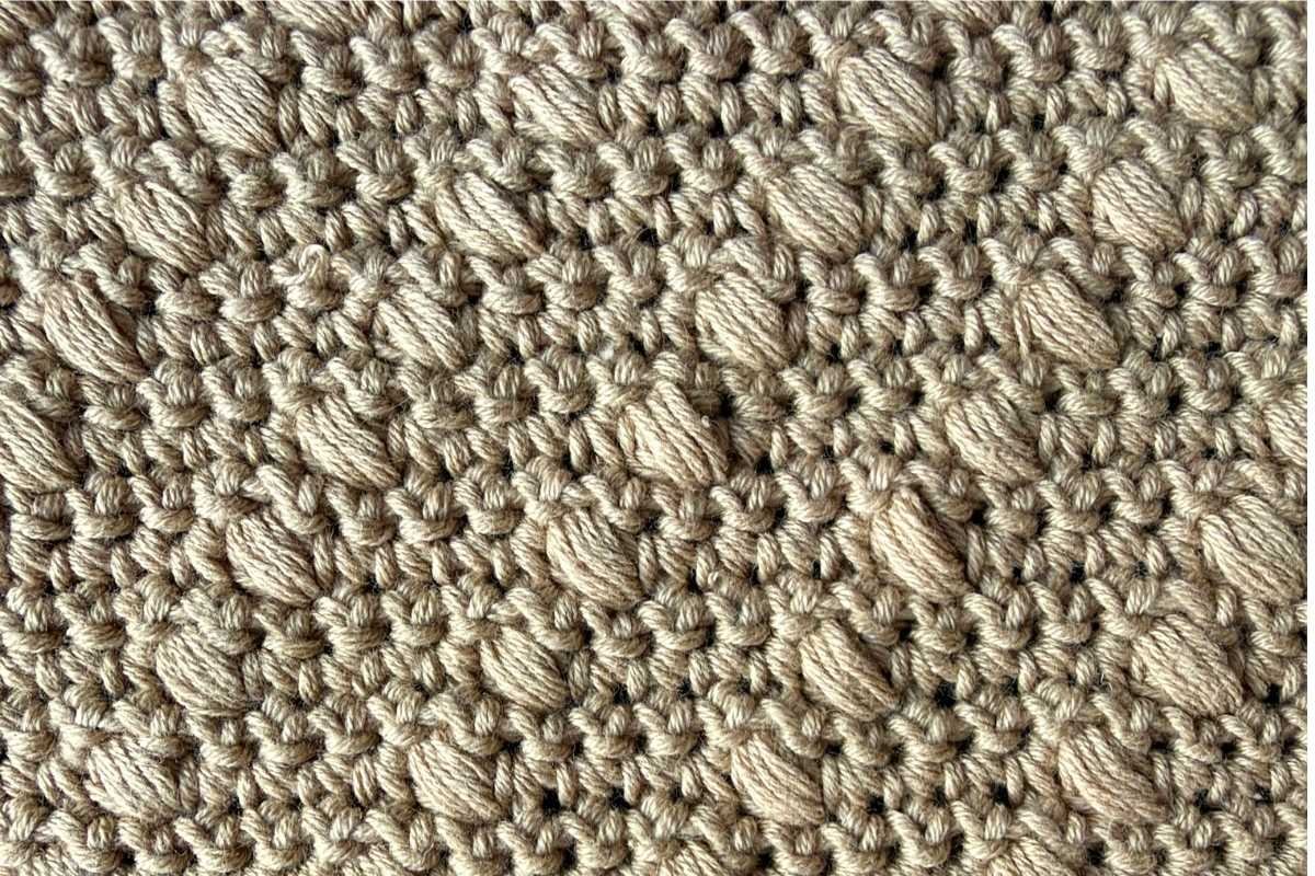 Swatch of a crochet diagonal bobble stitch