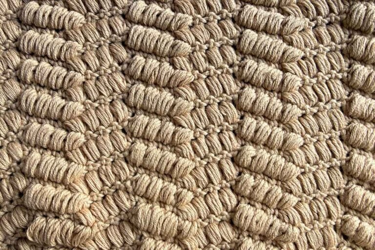 Close up image of the crochet puff path stitch