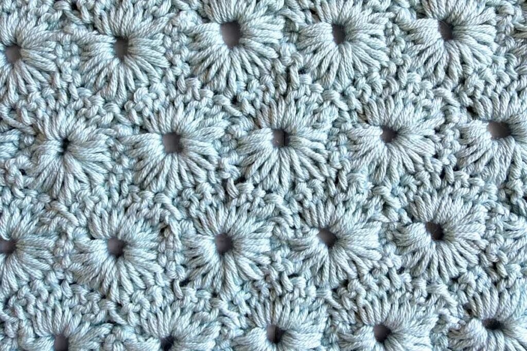 Close up of the crochet sunburst fan stitch